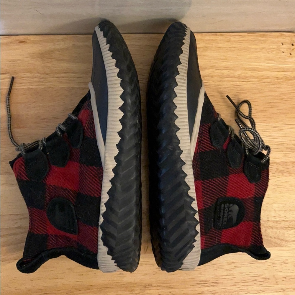 Sorel Out 'N About Plus duck boots in a red and black buffalo plaid pattern. - Picture 7 of 10